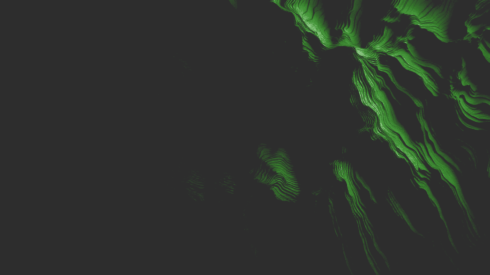 A relief model of layered contour ridges in green on charcoal, the ridgelines running off the right edge.
